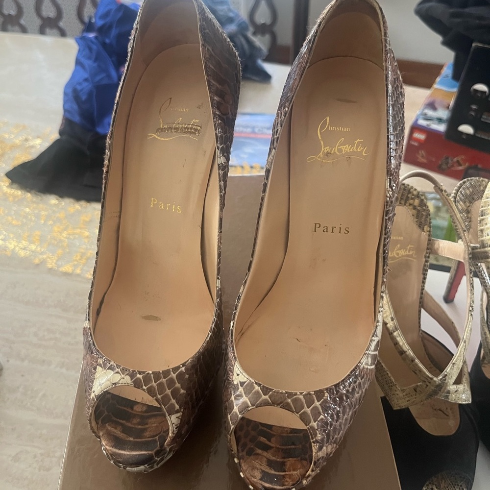 Snake skin peep toe high red bottom heels